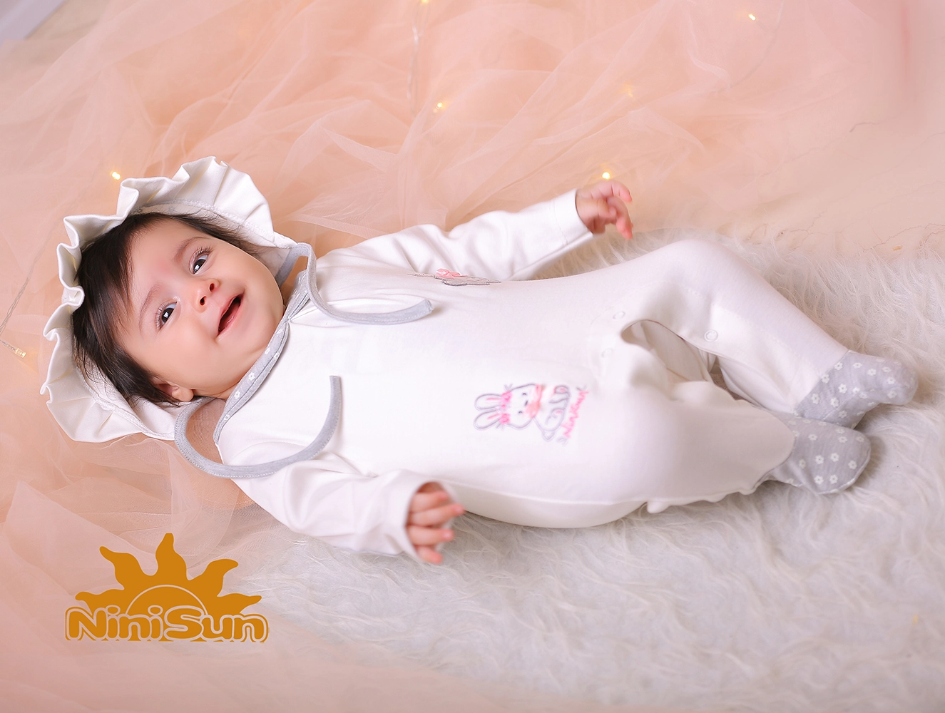 راهنمای انتخاب سایز لباس نوزاد نی نی سان